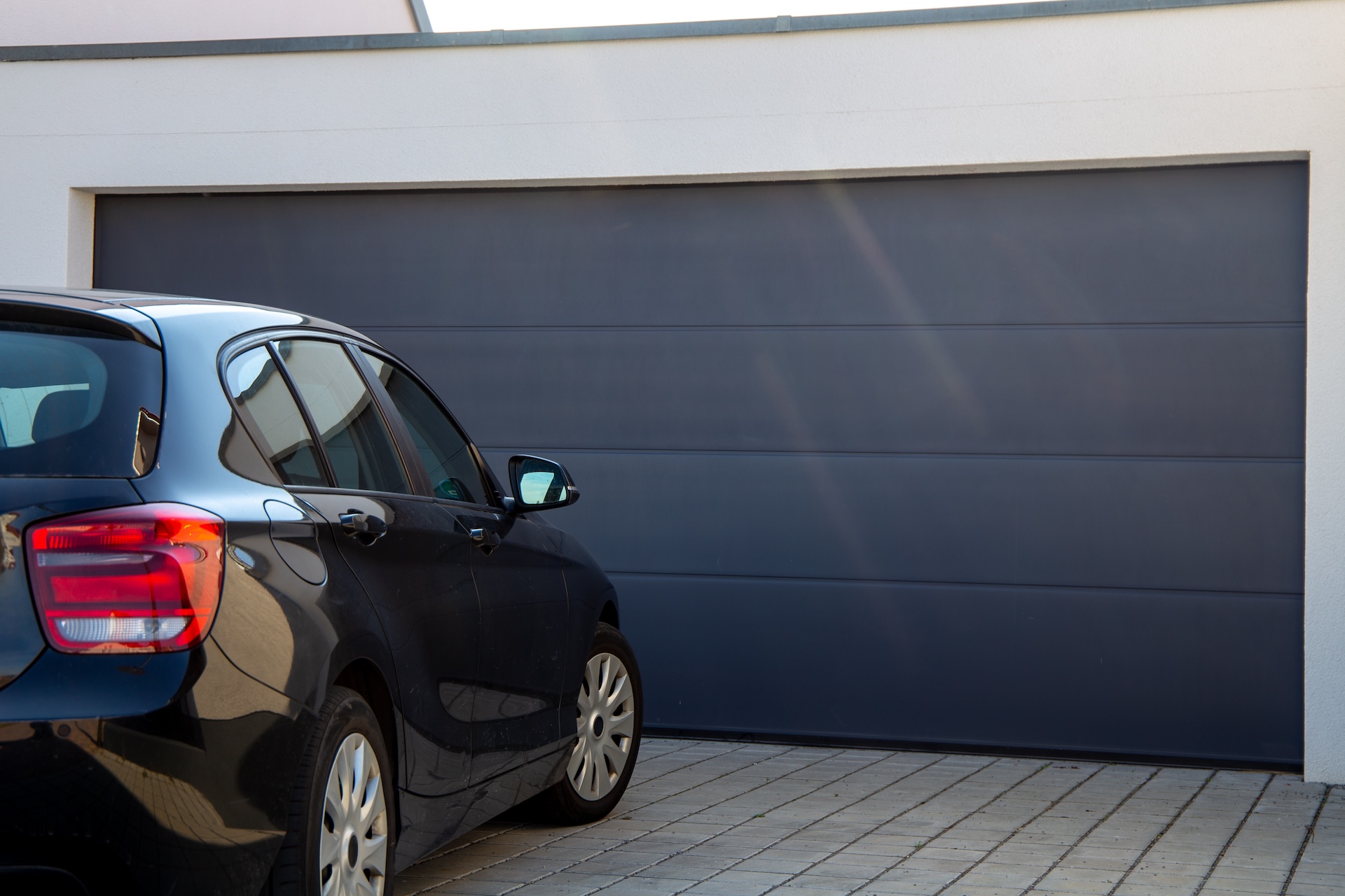 Car in front of garage door