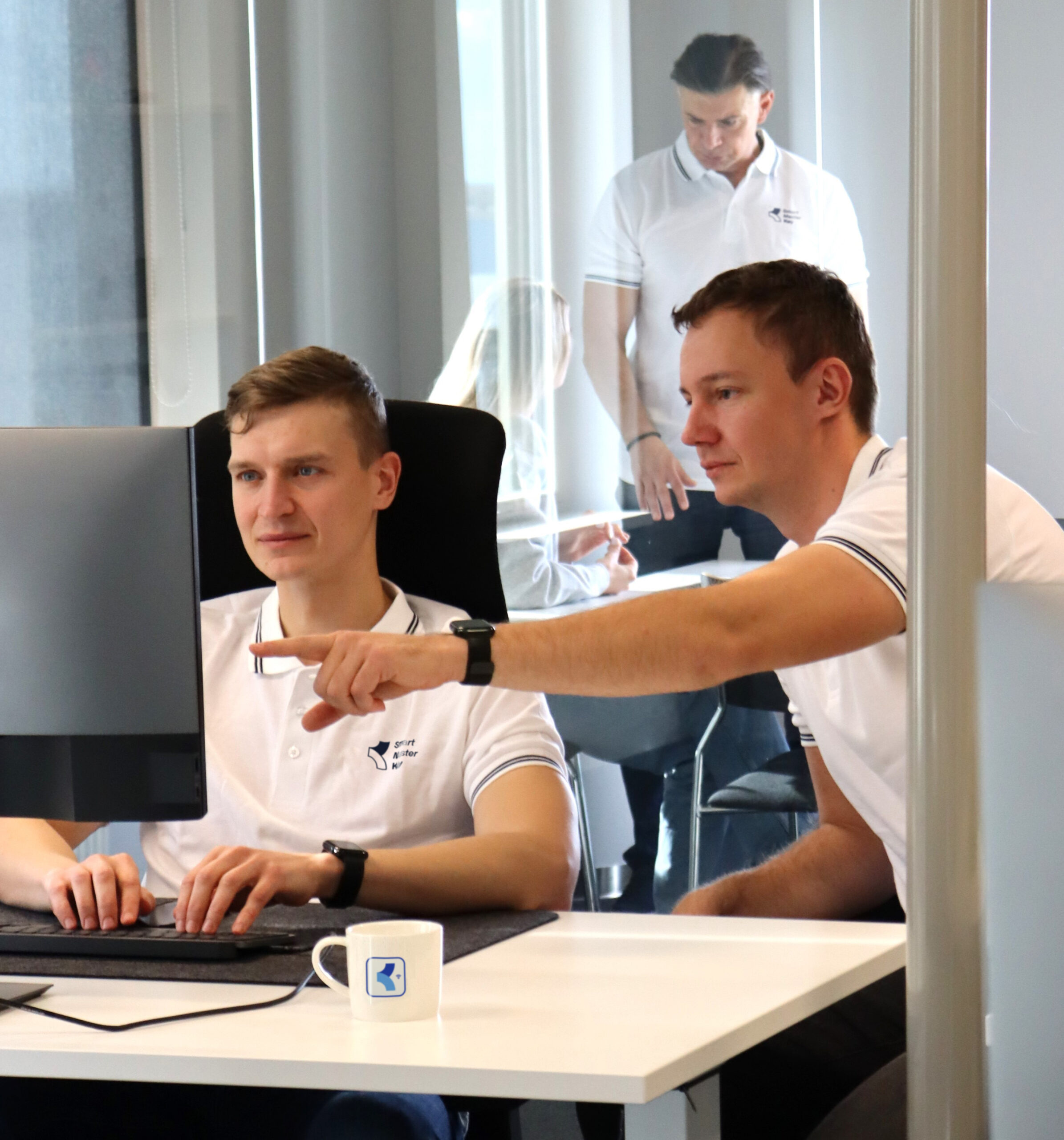 Smart MasterKey team members working in the office