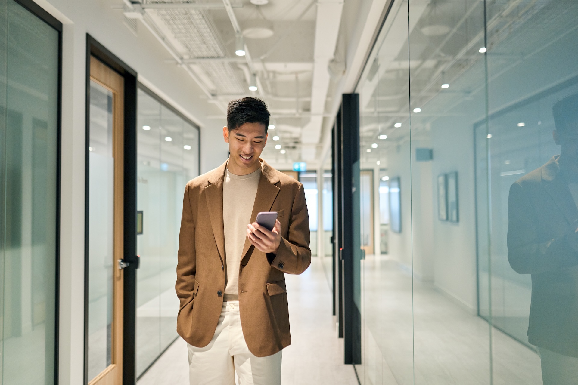 Office worker using smartphone access in office